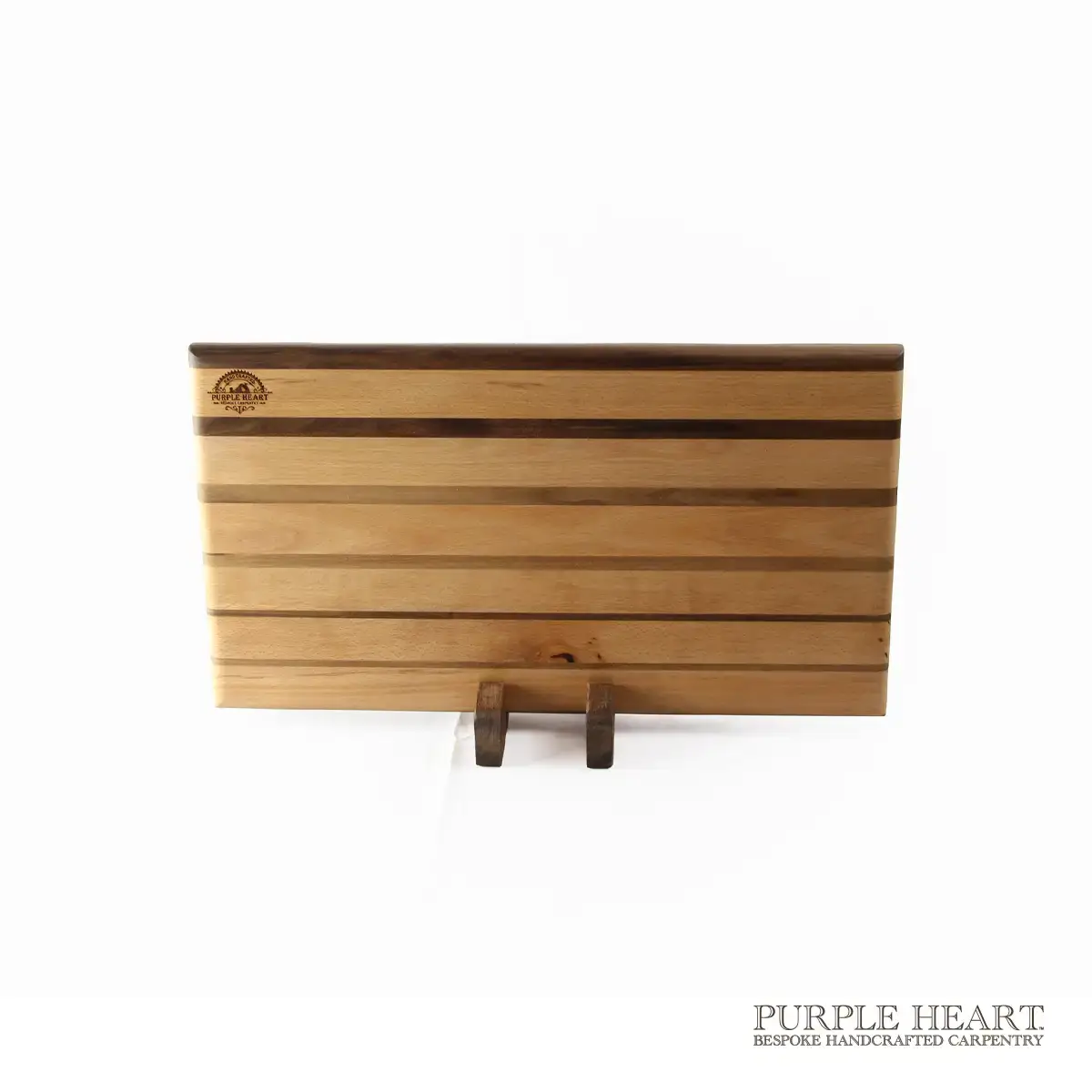 Handcrafted cherry and walnut striped wooden chopping board with contrasting hardwood design