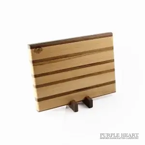Handcrafted cherry and walnut striped wooden chopping board with contrasting hardwood design