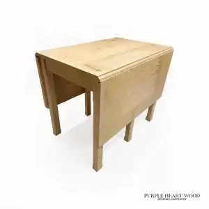 Handmade solid hardwood extendable drop leaf table with natural wood finish and folding side panels